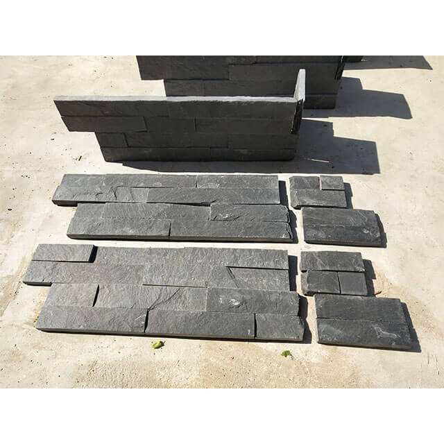 Esquina de panel de piedra negra
